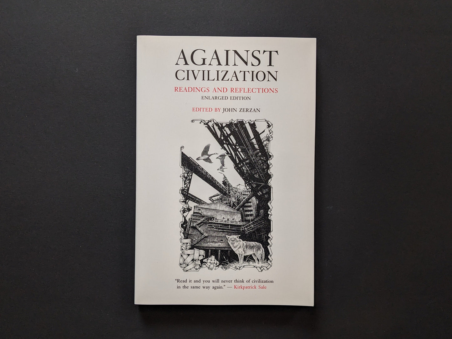 Front cover of the book Against Civilization featuring industrial ruins and a wolf - Against Civilization – Edited by John Zerzan - Lokator100