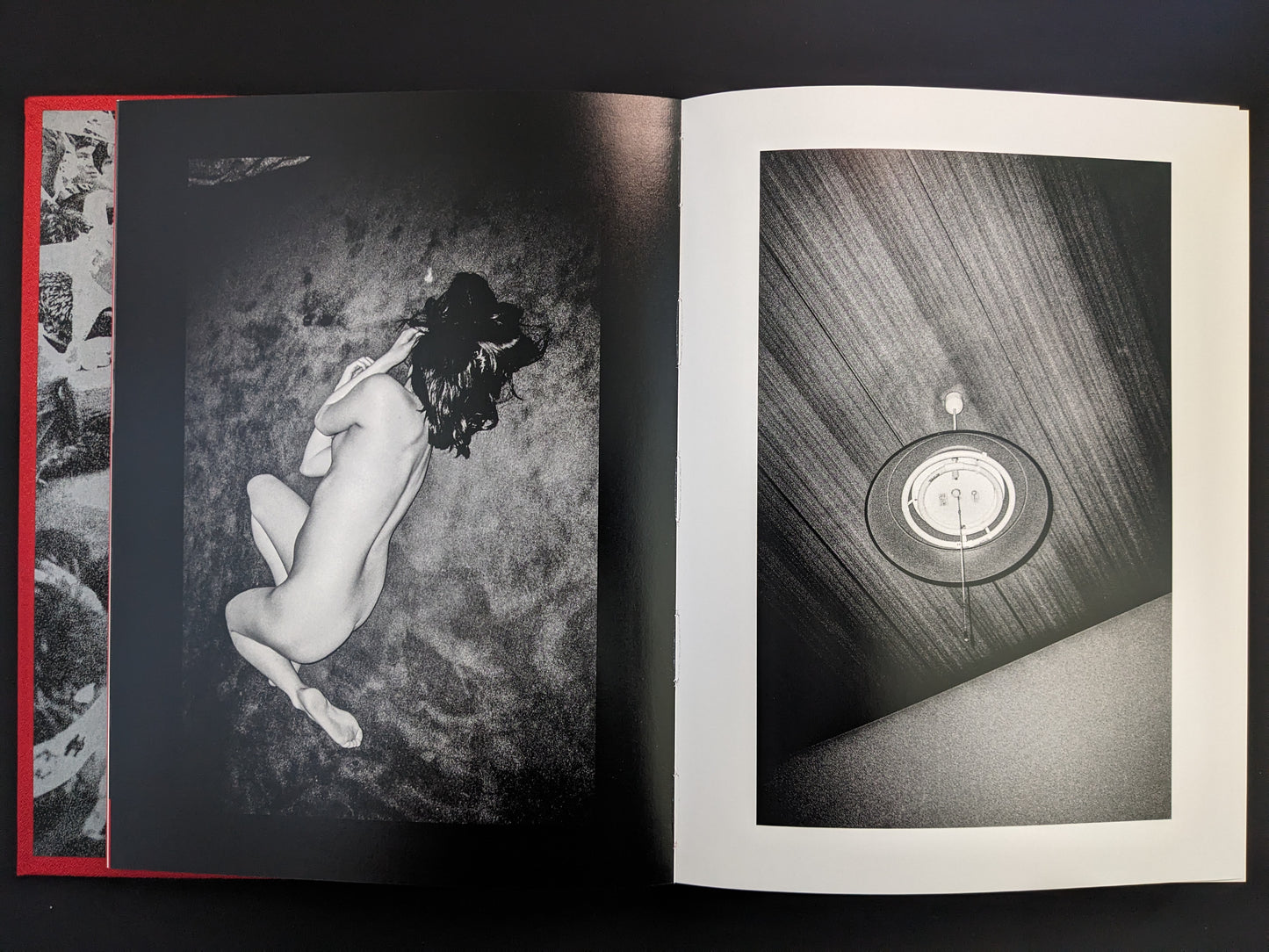 Nude woman on carpet in a dim room, paired with a ceiling lamp detail.