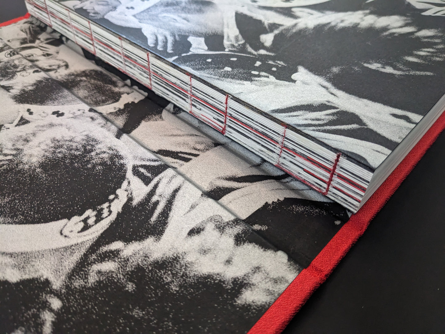 Close-up of the exposed thread binding in the book Asakusa