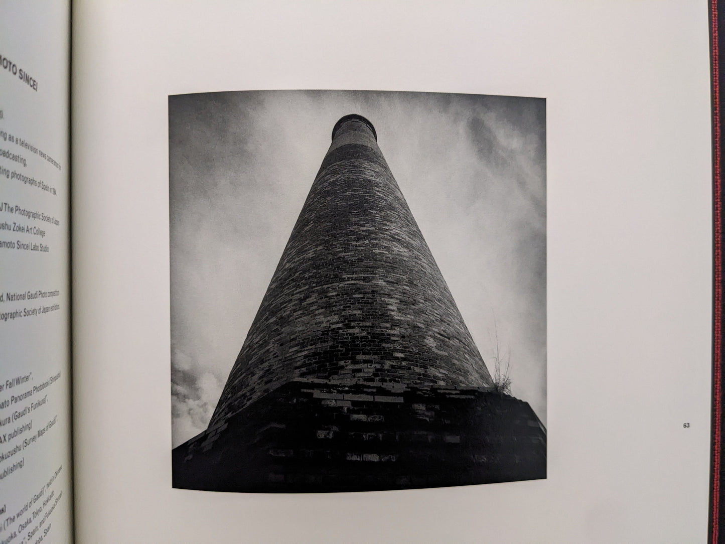 Vertical brick smokestack against the sky, from Berg Werk by Sincei Yamamoto