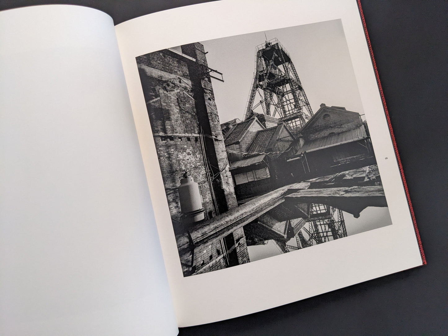 Black-and-white photograph of coal mine industrial structure from Berg Werk by Sincei Yamamoto
