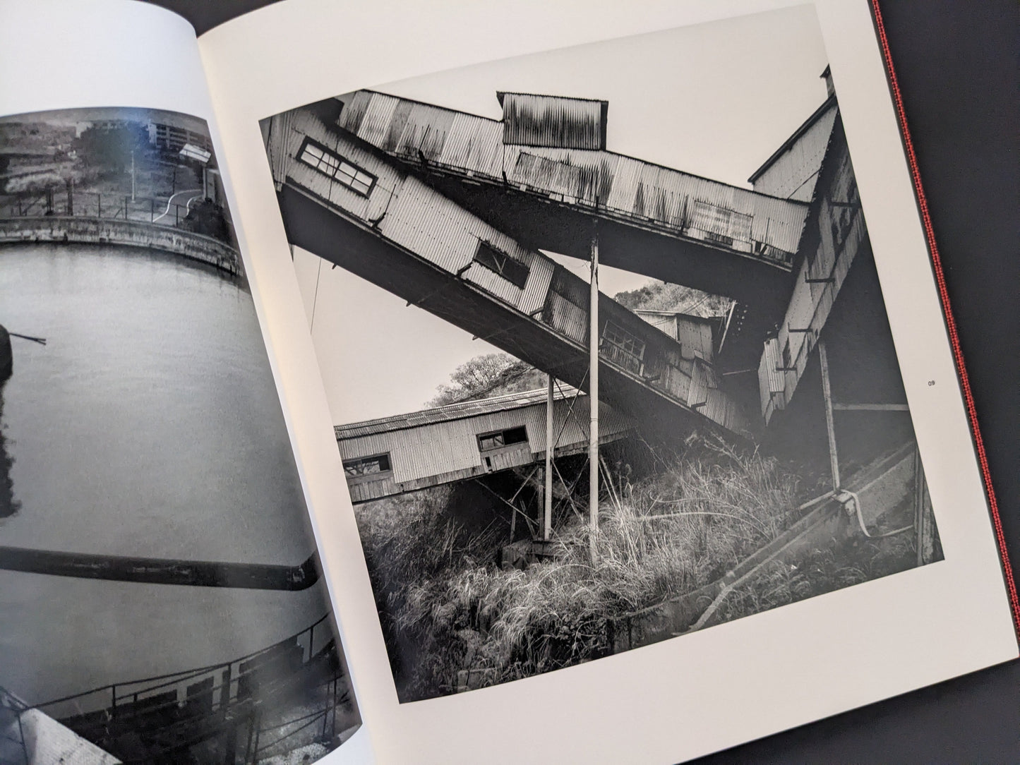 Photobook Berg Werk by Sincei Yamamoto, image of factory conveyor system and buildings