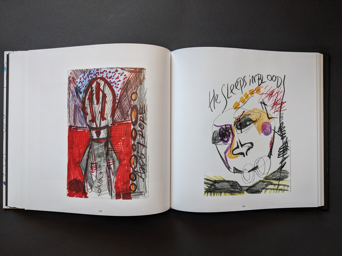 Two crayon-style portraits: one with a red background and totem-like form, the other reading “He sleeps in blood.”