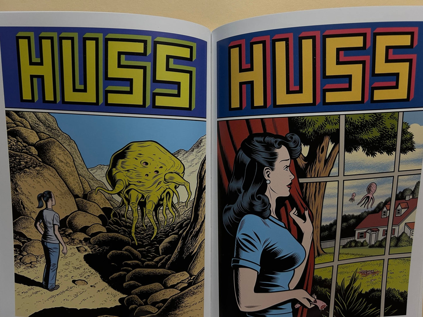 Interior spread from Caprice by Charles Burns with two HUSS covers: a yellow creature in a rocky landscape and a woman by a window.
