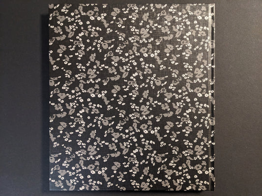 Back cover of Cheryomushki by Nikolay Bakharev, showing the floral-patterned cloth binding.