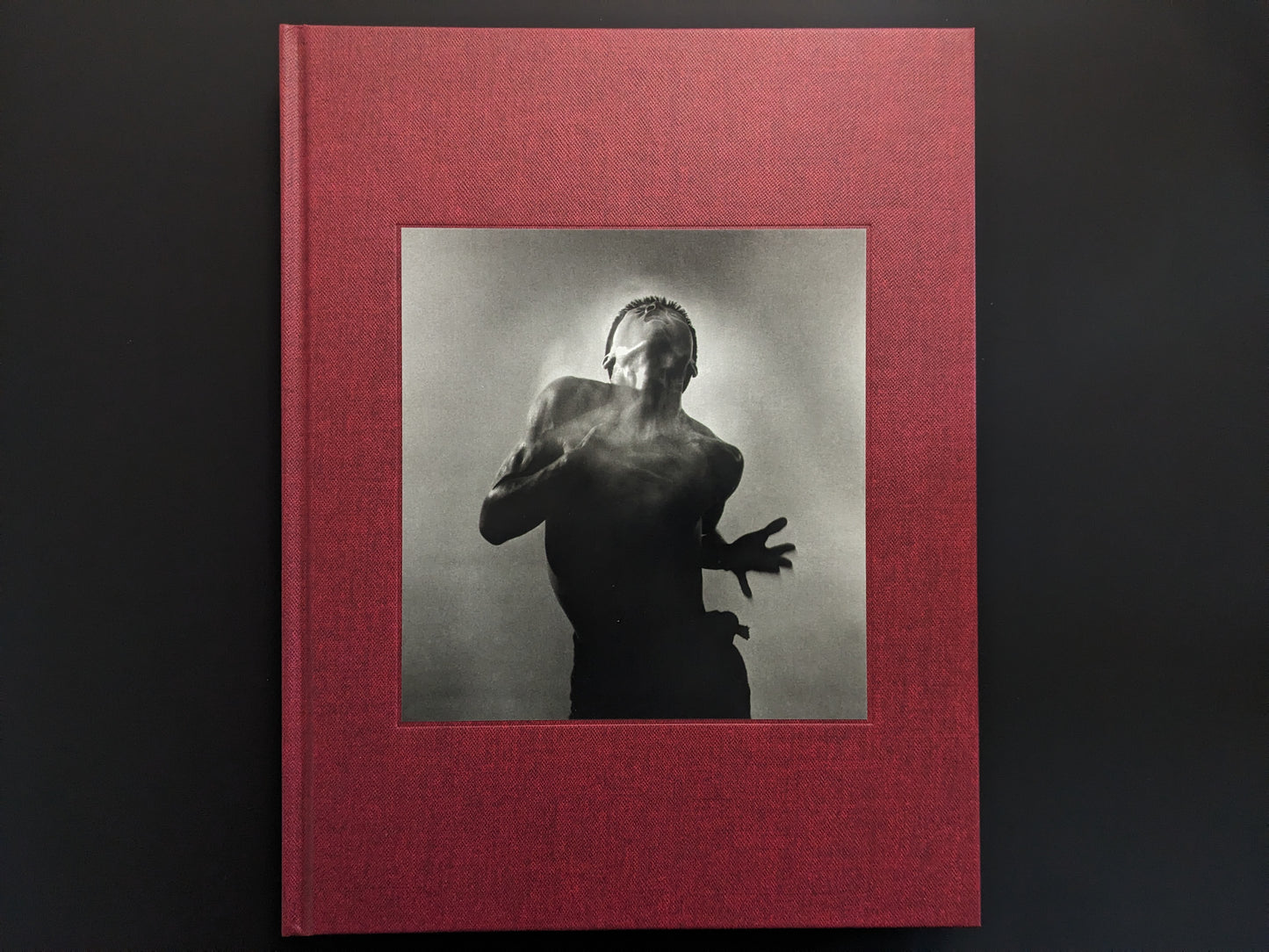 Front cover of 'Eikoh Hosoe (English edition)' featuring a black-and-white photograph of a dancer