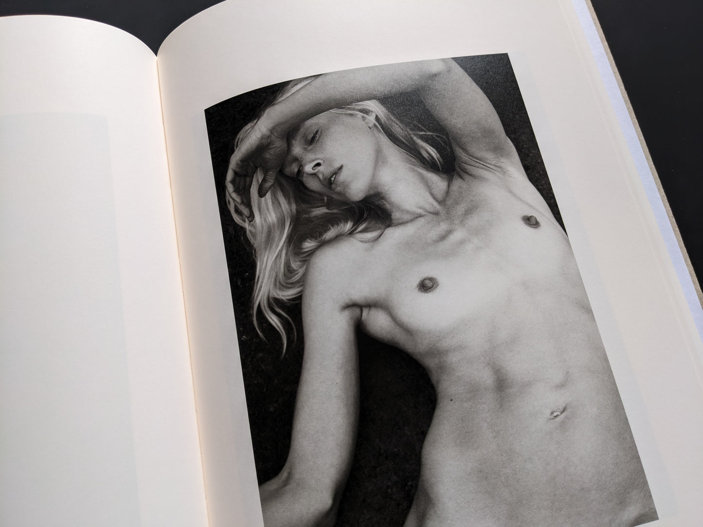 Monochrome portrait of a reclining nude woman from ELV by Massimo Leardini