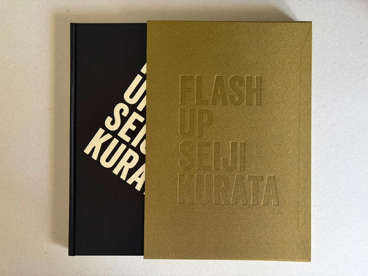 Flash Up by Seiji Kurata, book with gold slipcase partially covering the cover