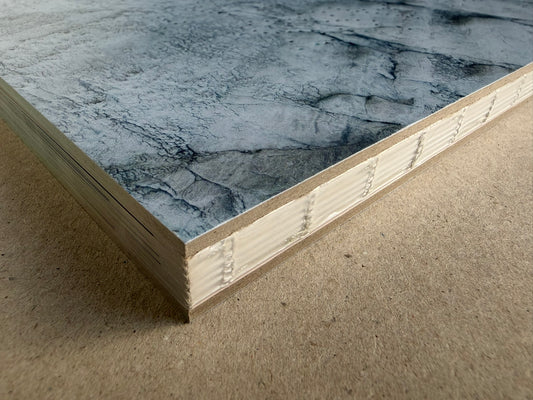 Glass Mountain by Michael Lundgren, close-up of the book cover edge with chopped boards and stitched binding