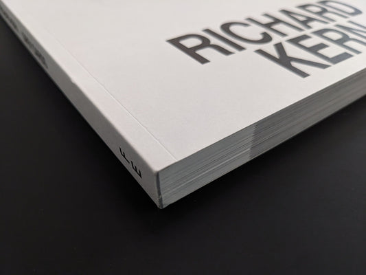 Close-up of the softcover spine and page block of Grey Cards by Richard Kern