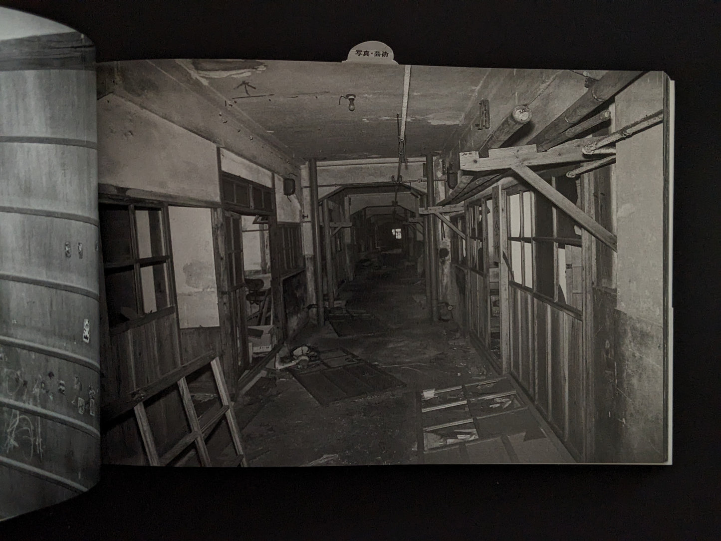 Dark corridor of abandoned buildings photographed on Hashima Island