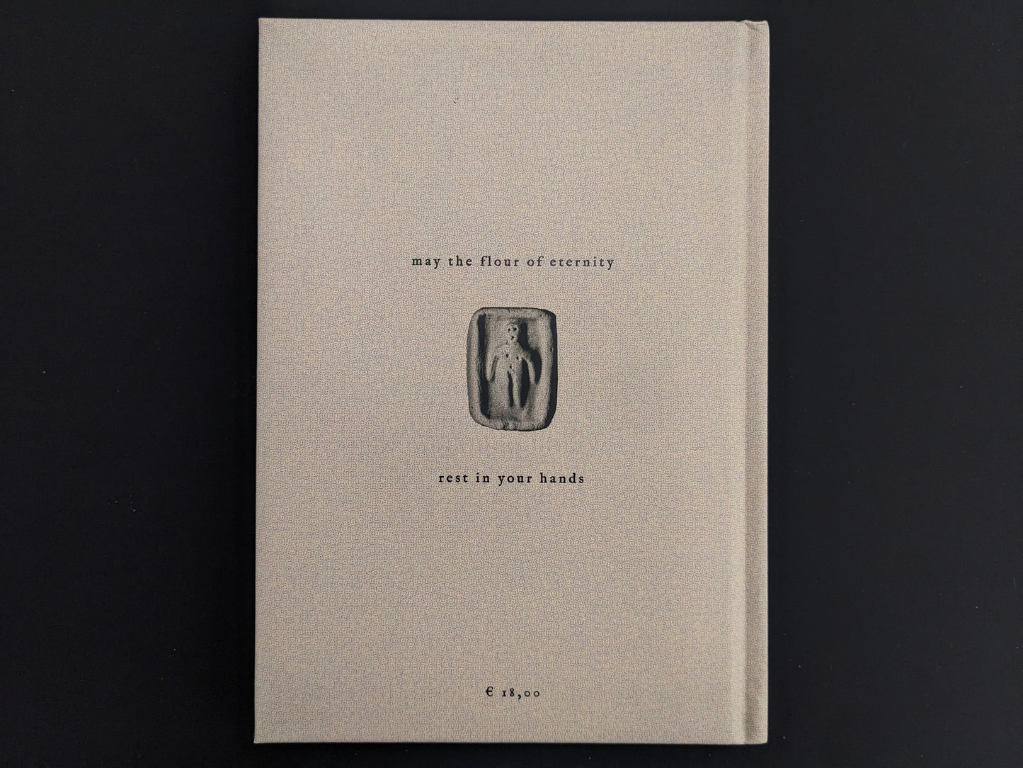 Back cover of How to Bake a Breadling with minimal Hollow Press artwork