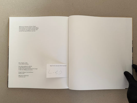 Open signed edition of Huts, Temples, Castles by Ursula Schulz-Dornburg, showing the copyright page and a signed slip bound into the back cover