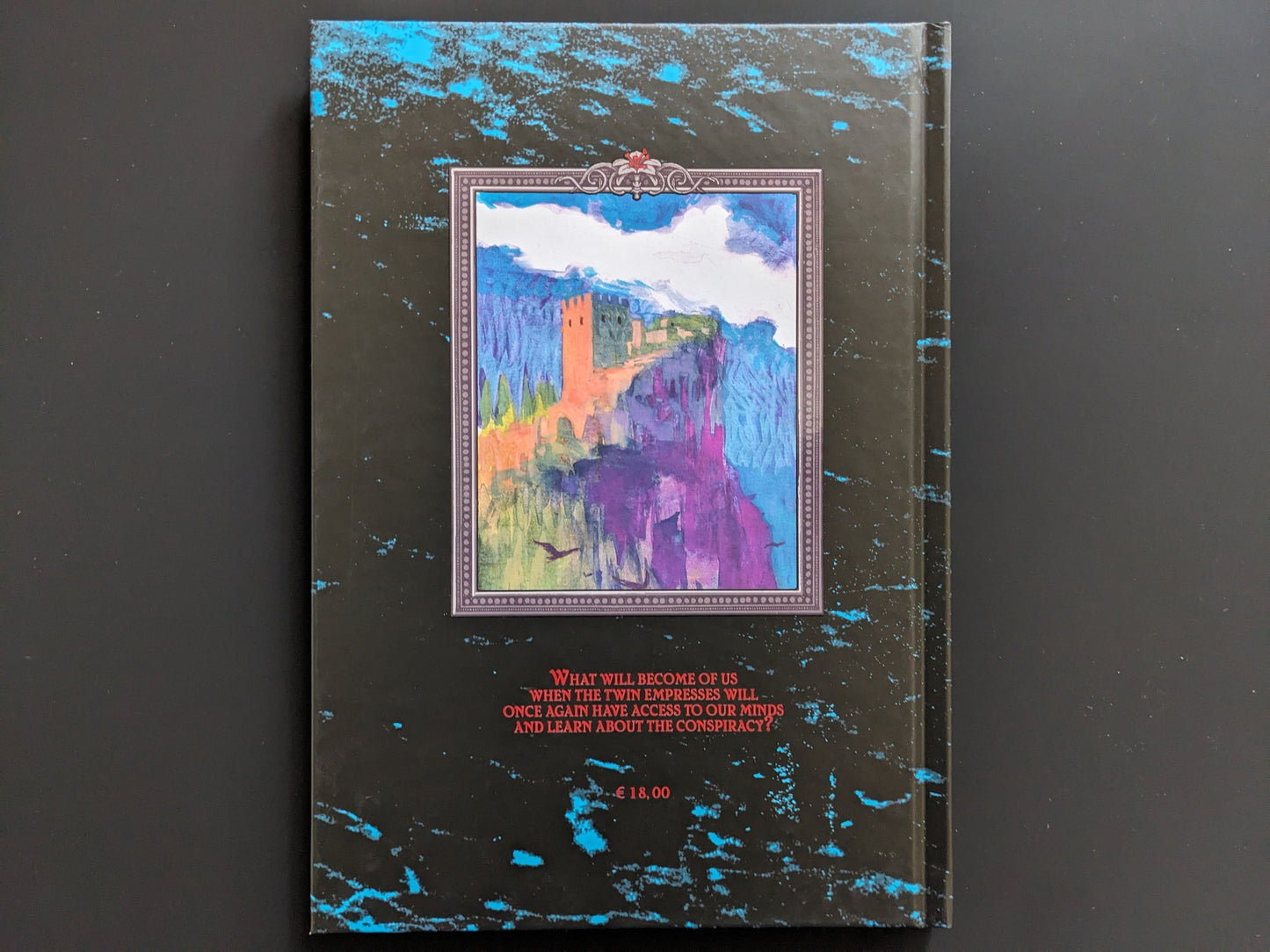 Back cover of Leyre with abstract painted artwork and an excerpt