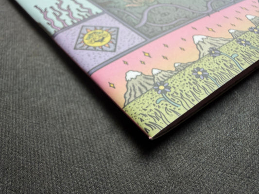 Mana by Dina Omut, close-up of the lower cover corner and spine edge