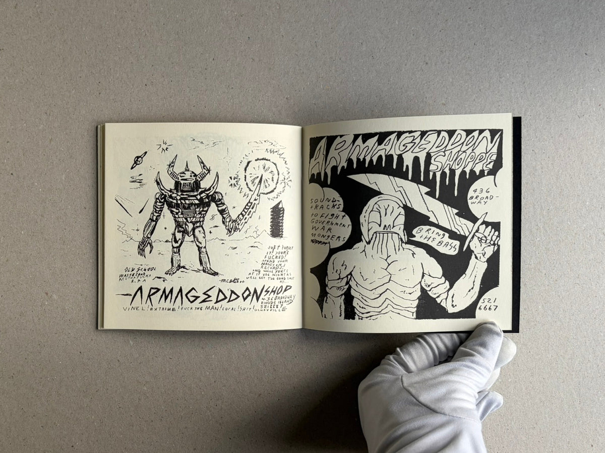 Open sketchbook spread from Multiforce Shit by Mat Brinkman, showing black-and-white drawings on both pages.