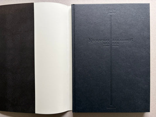 Necrophantasmagoria Vanitas by Takato Yamamoto, open to the front endpapers and embossed title page.