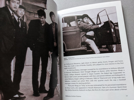 Vintage photo of four young men in suits and a seated man by a car door – early stars of Nikkatsu Action.
