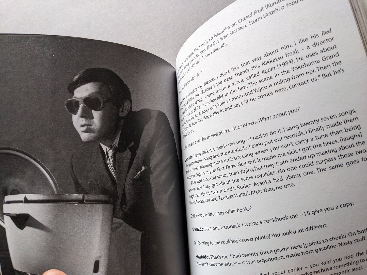 Stylish black-and-white photo of Joe Shishido in sunglasses next to an interview excerpt.