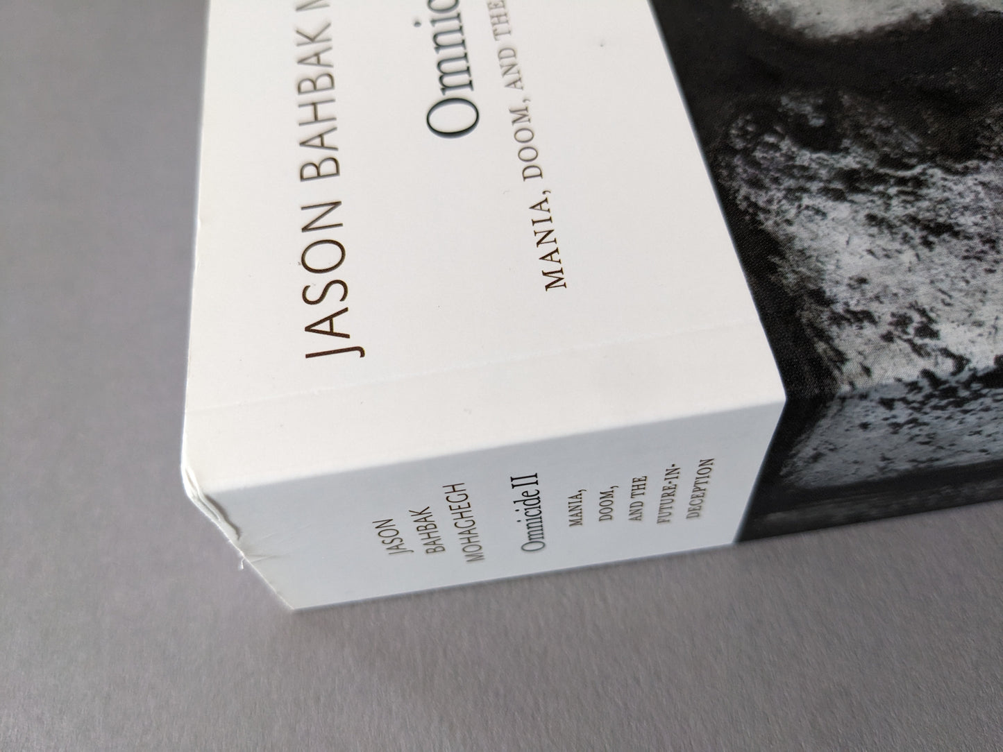 Folded edge and scuff on the top of the book cover – minor cosmetic defect.