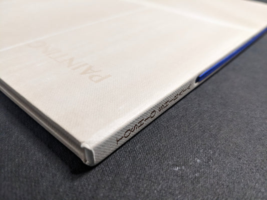Spine detail of Painting by Toshio Shibata, with the printed title and blue ribbon visible.