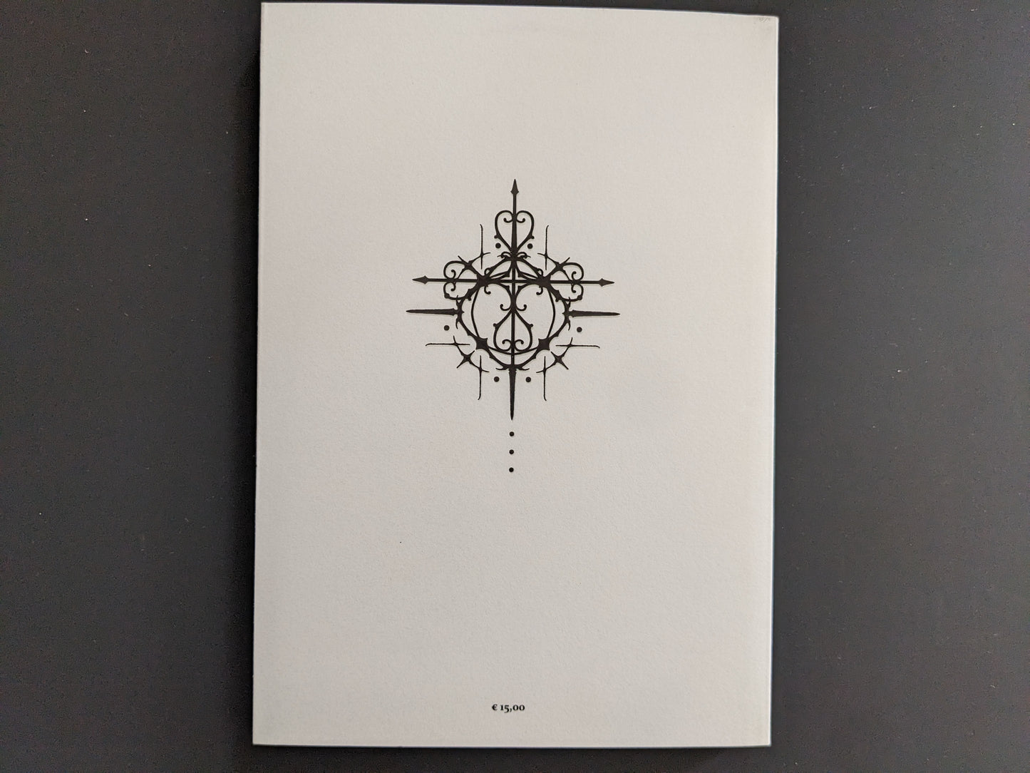 Back cover of the book 'Parasite Moon Orchestra' by Ghaaro, featuring a symmetrical sigil in black.