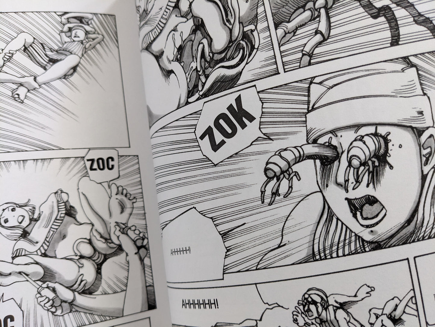 Graphic page from 'Parasitic City #2' with grotesque parasite creatures bursting from a character’s eyes.