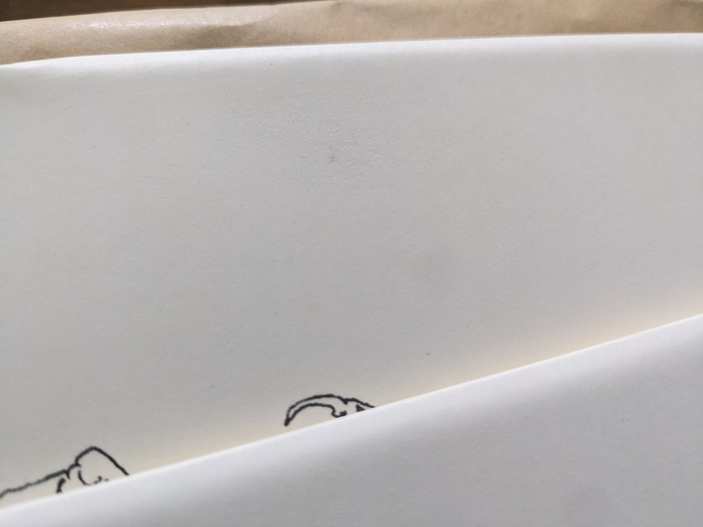 Small production stain visible on the cover.