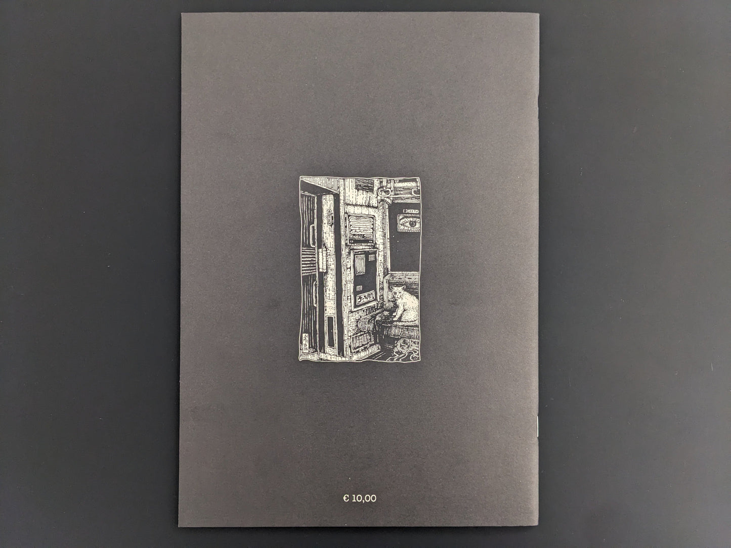 Back cover of Rattling City #1 by Demitri Vassiliadis, published by Hollow Press