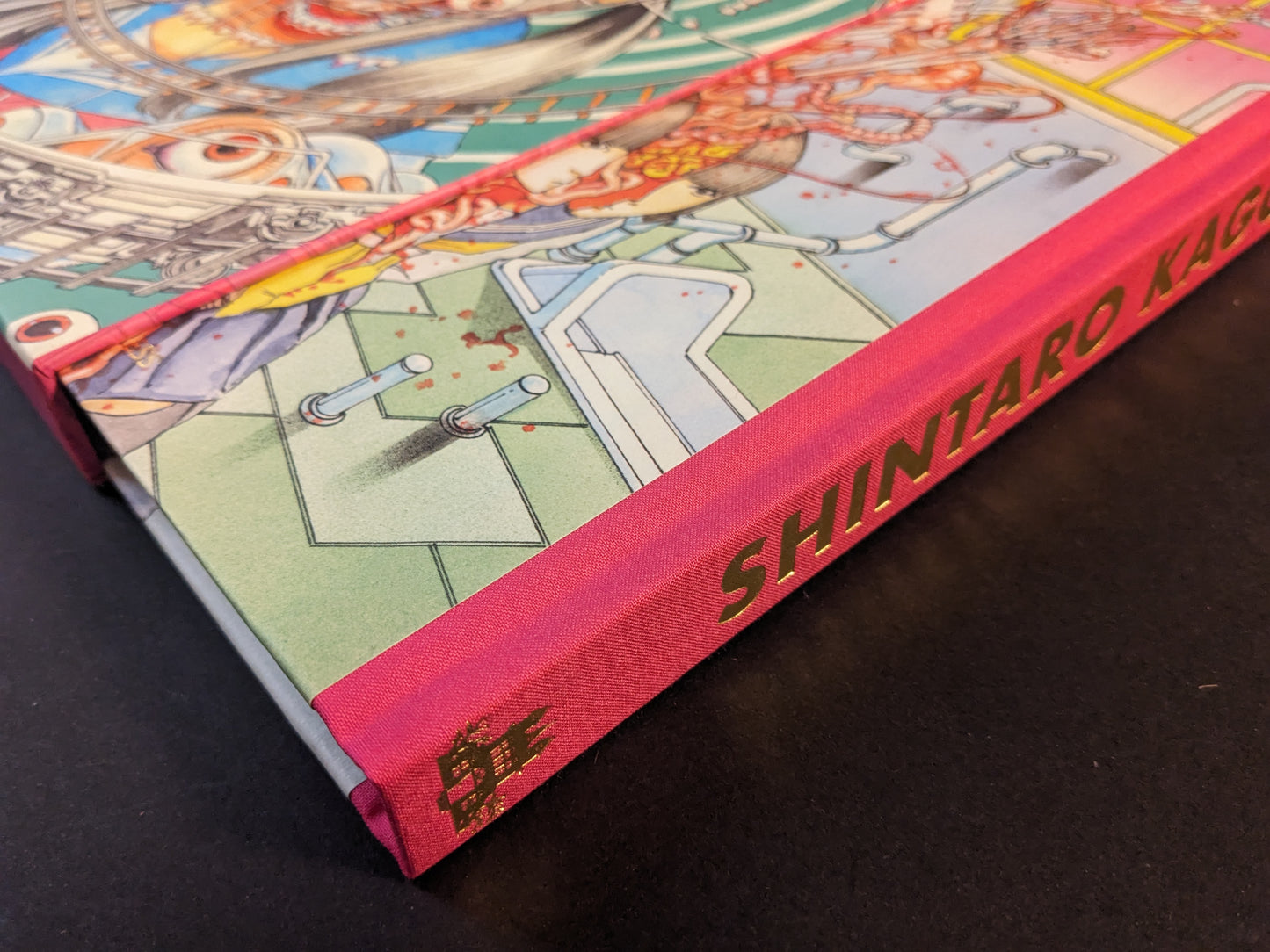 Cloth spine detail with gold Shintaro Kago title, Artbook Vol. 3 collector’s edition