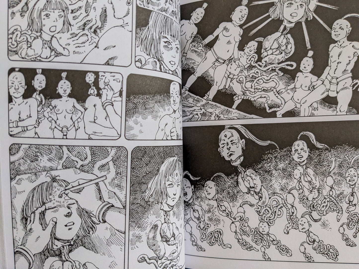 Scene depicting floating heads and disembodied characters in a grotesque ceremony