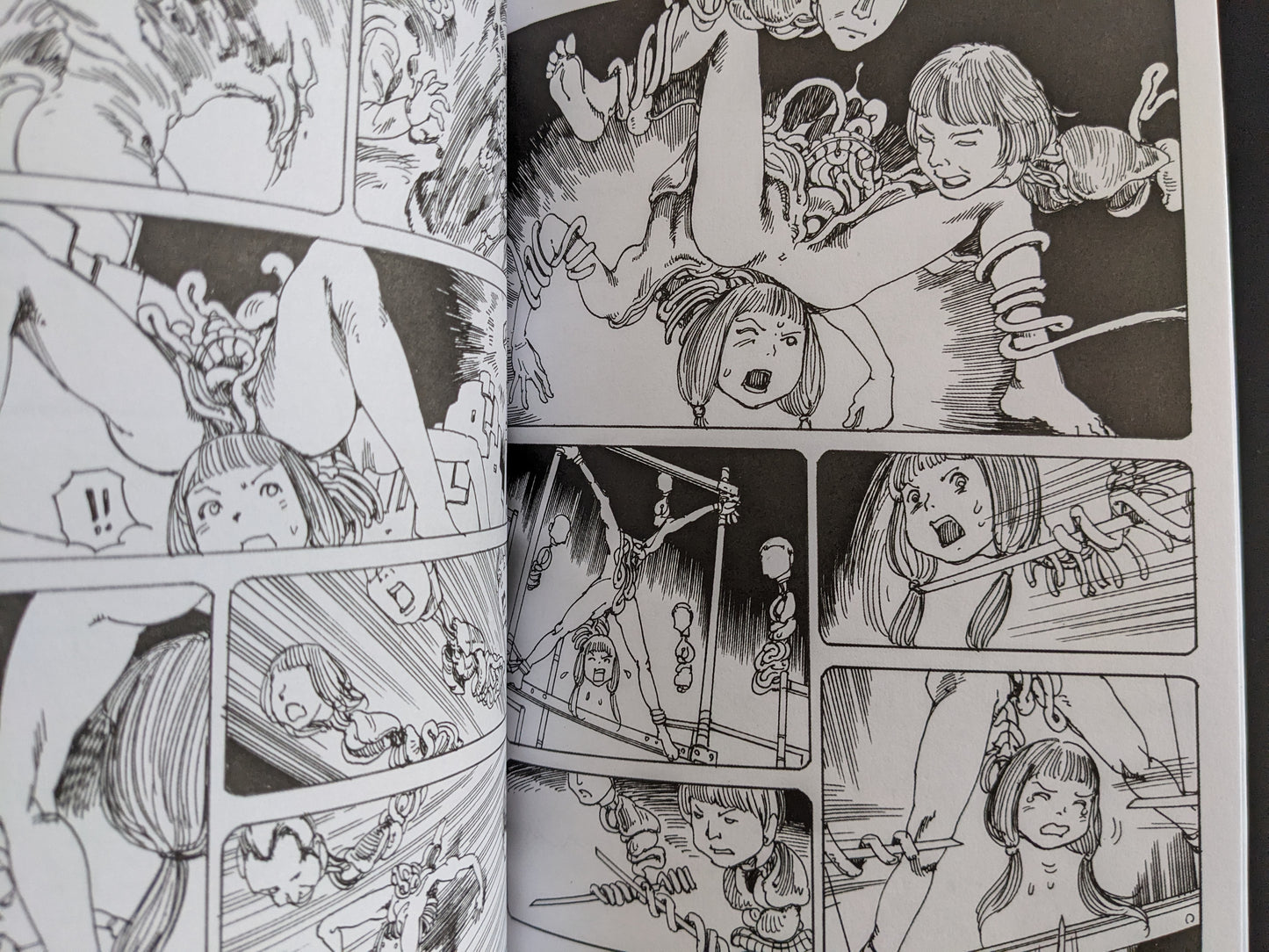 Comic panel with surreal body horror, characters entangled with tentacles and suspended in space