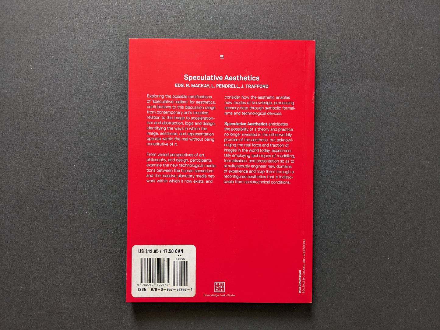 Back cover with full description text and ISBN details.