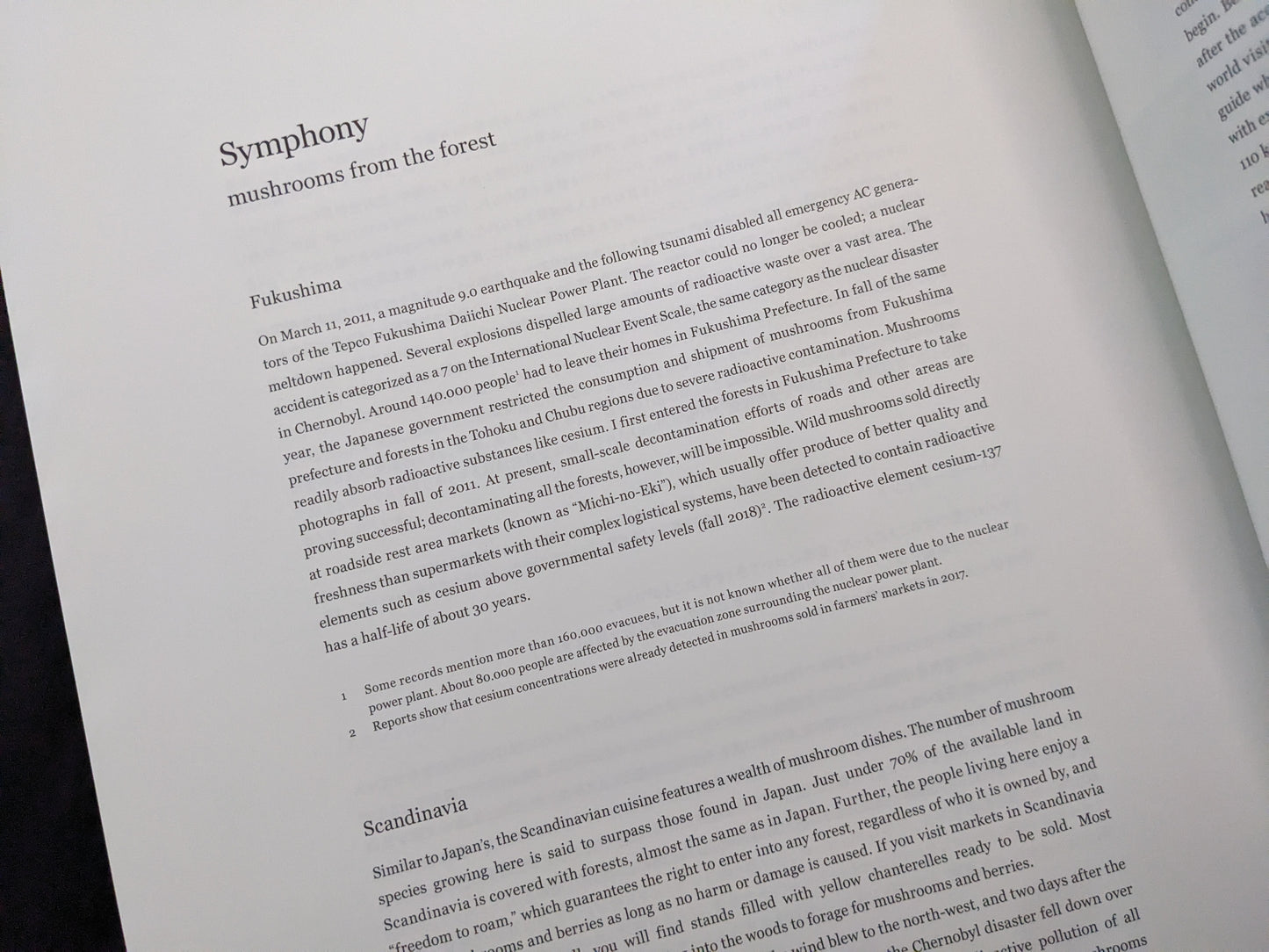 Text spread describing the Fukushima nuclear disaster and its ecological impact