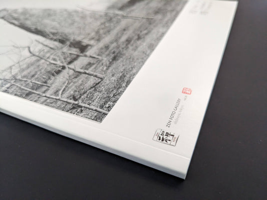 Close-up of the cover image, showing the stone pagoda detail on The Ancient Towers softcover.