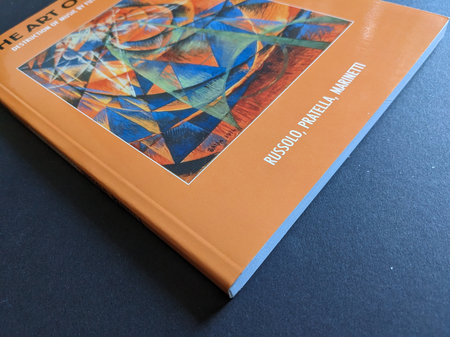 Book spine and angled view of The Art of Noise showing title and authors: Russolo, Pratella, Marinetti.