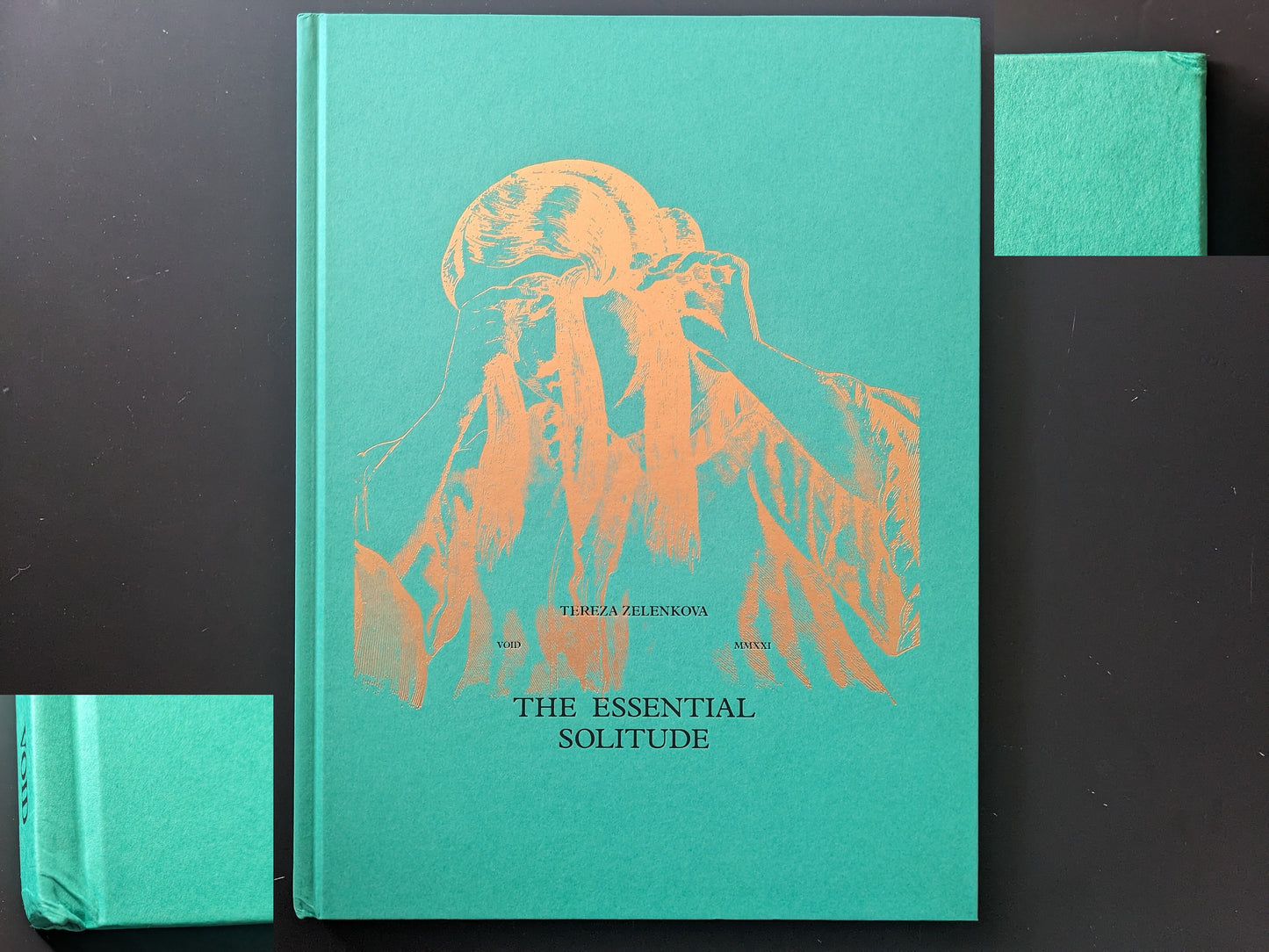The Essential Solitude by Tereza Zelenkova — front cover with gold foil figure on teal cloth; inset close-ups show bumped spine corners and compressed boards (binding damage).