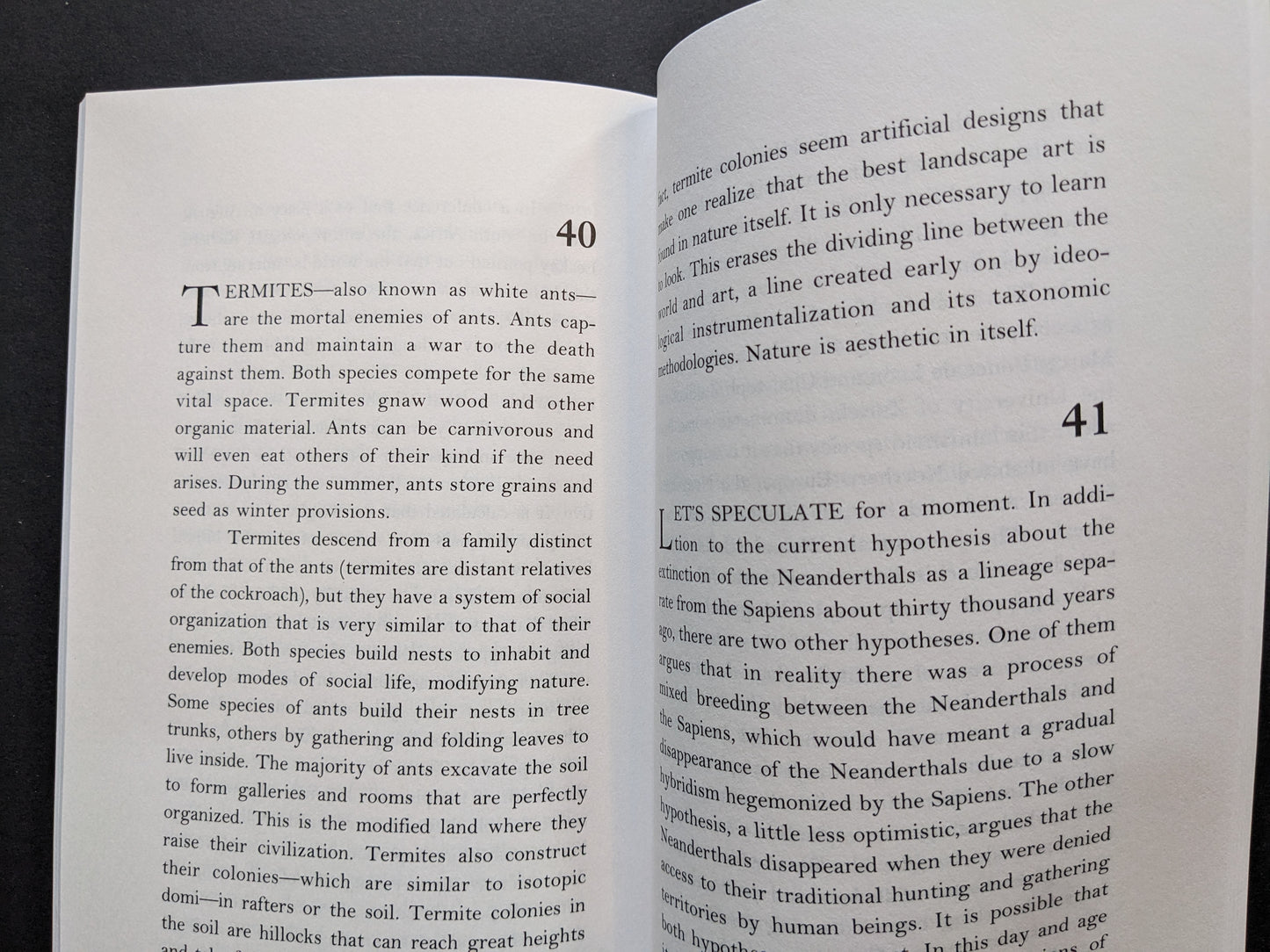 Book page about termites and ants, examining their social structures and metaphorical relevance to nature and civilization.