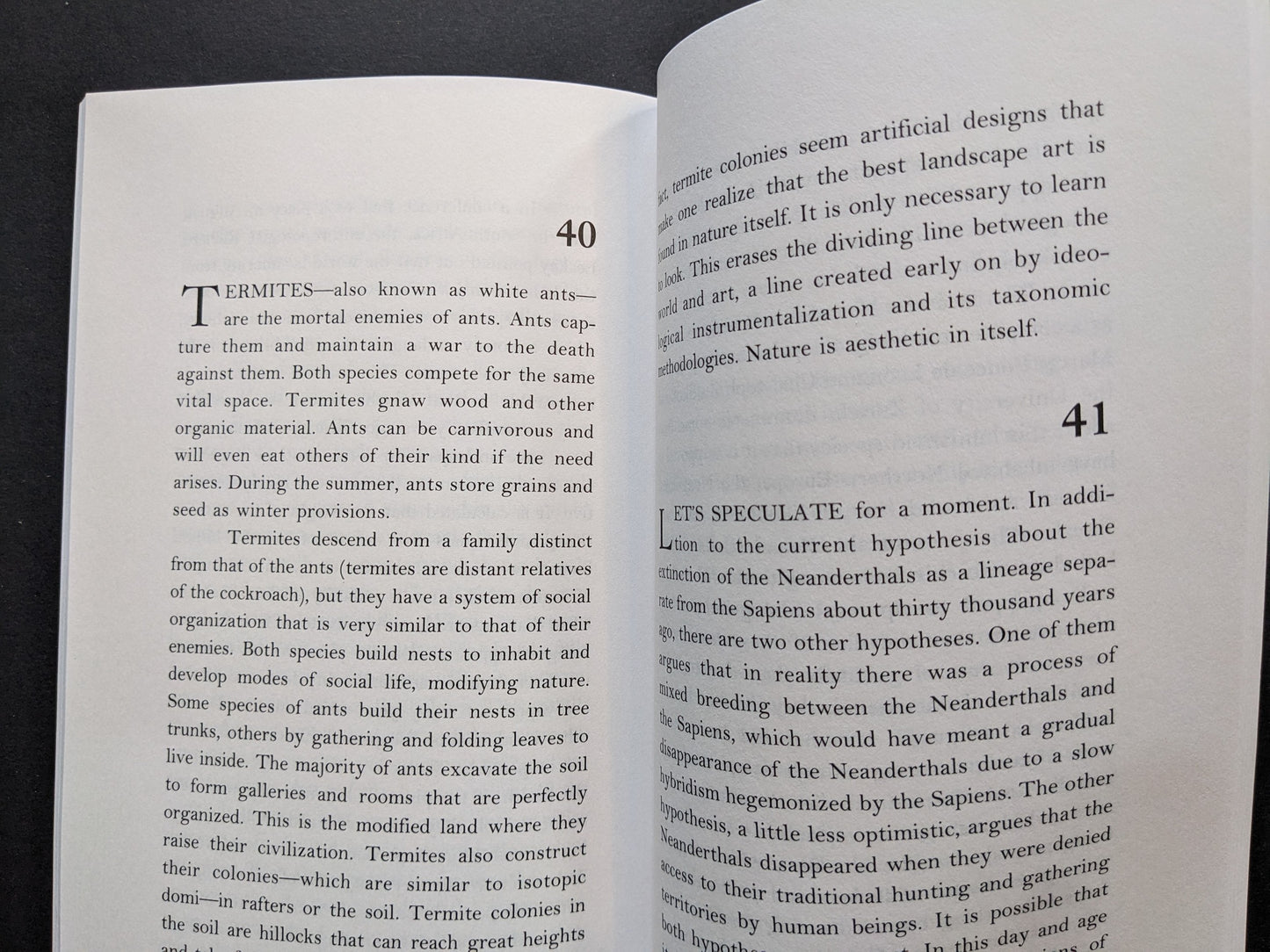Book page about termites and ants, examining their social structures and metaphorical relevance to nature and civilization.