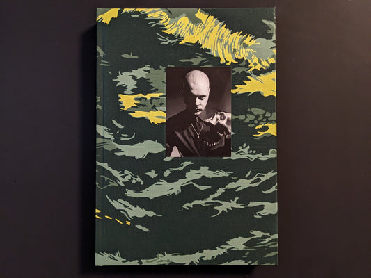 Front cover of the clothbound limited edition with a portrait of Genesis P-Orridge.