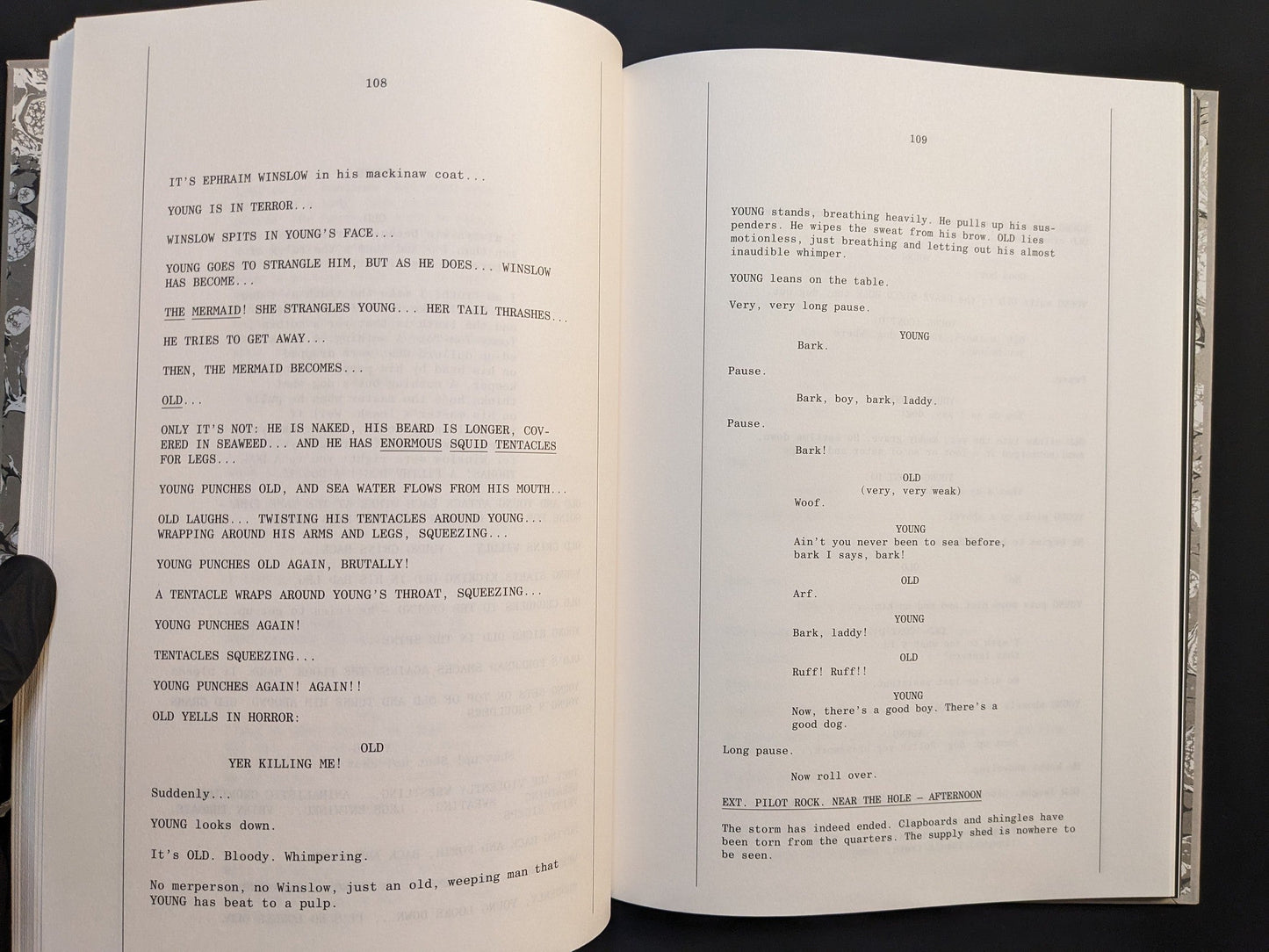 Interior view showing screenplay layout from The Lighthouse Screenplay Book by Robert Eggers.