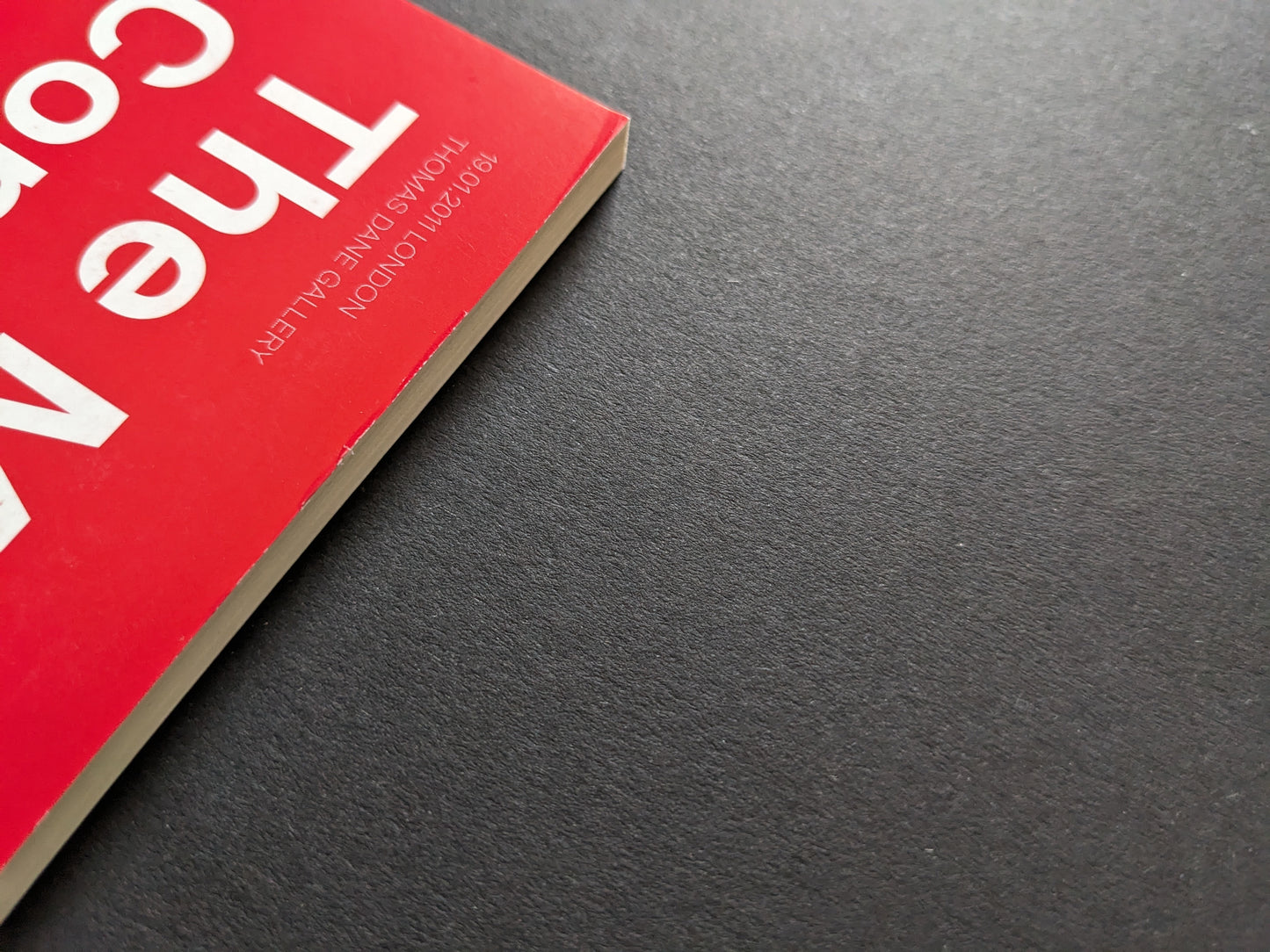 Detail of wear: bent corner on cover