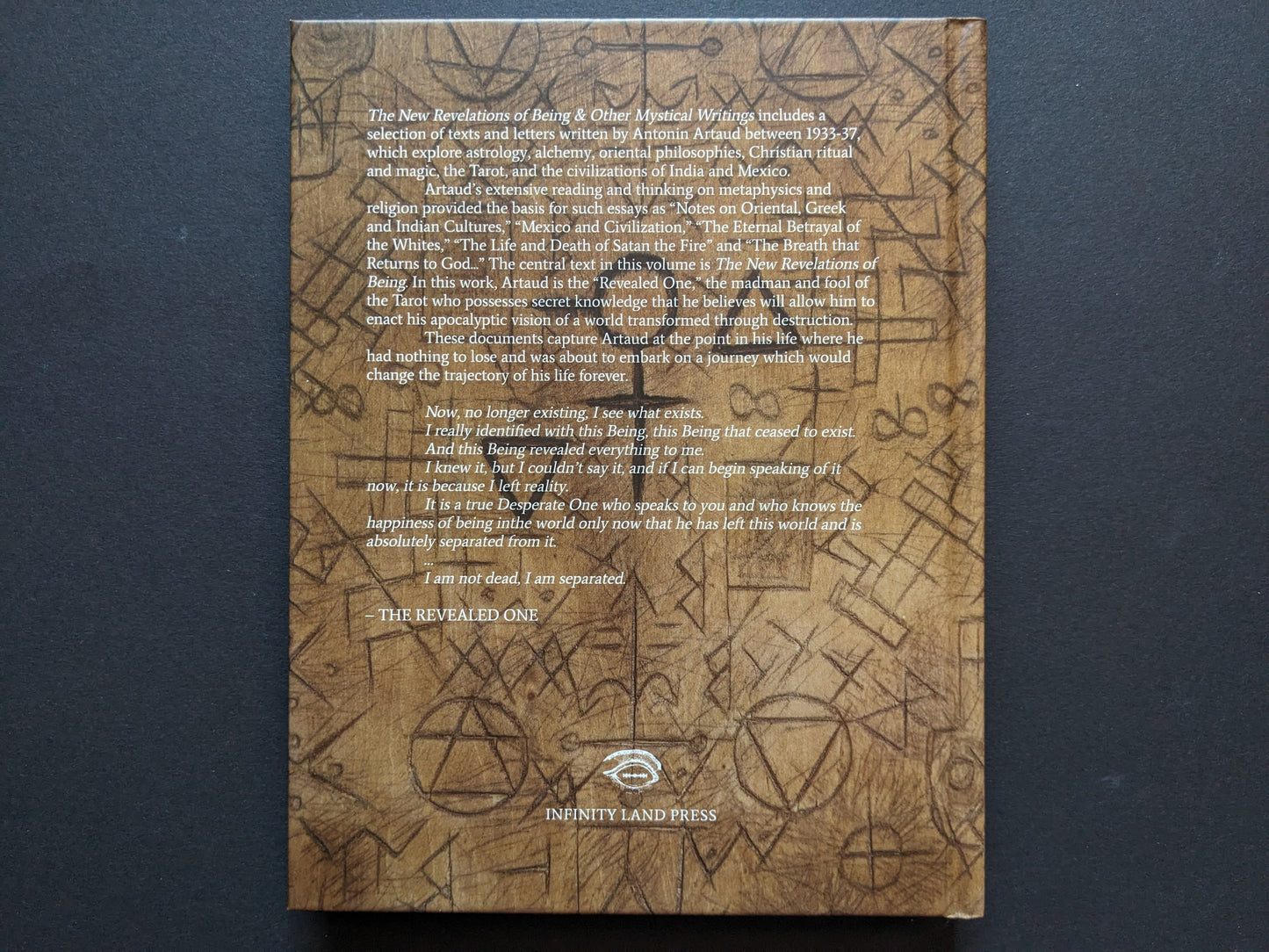 Back cover of The New Revelations of Being with synopsis text over a brown background of occult symbols.