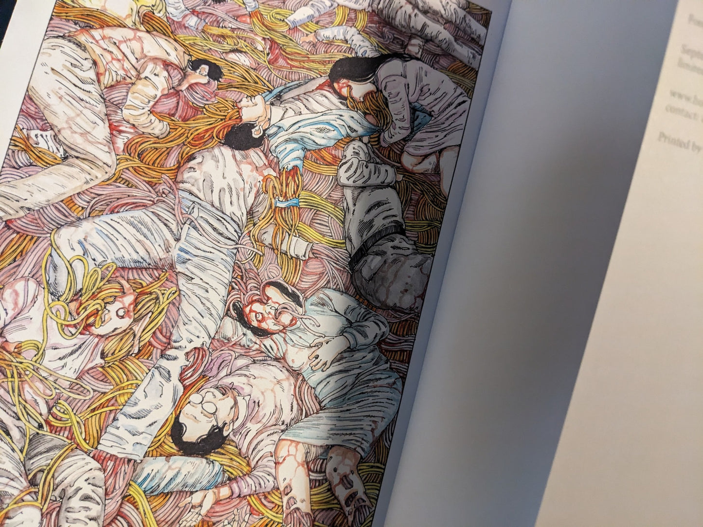 Close-up of a full-colour manga illustration with graphic imagery.