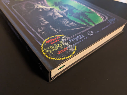 Spine of the Vermis II – Mist & Mirrors (Forsaken Edition) hardcover with green bookmark ribbon