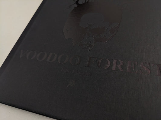 Front cover closeup of 'Voodoo Forest' by John Blanche with embossed skull and tree roots