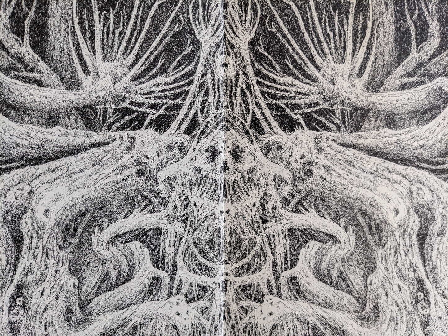 Inside illustration from 'Voodoo Forest' showing intricate, surreal tree-like skeletal forms