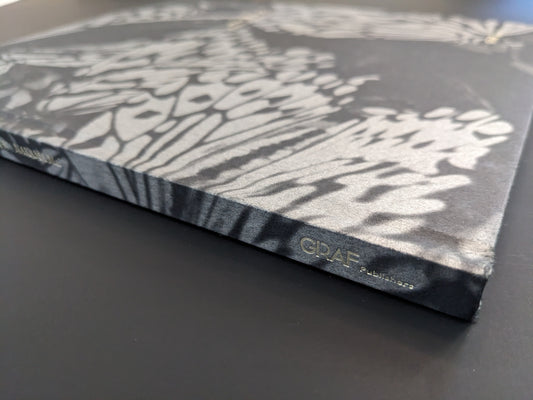 Close-up of the spine of Wandering Dog, published by GRAF Publishers