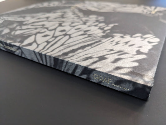 Close-up of the spine of Wandering Dog, published by GRAF Publishers