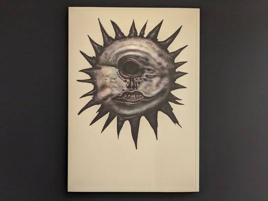 Back cover of Weird Tales of Postapoland with a disturbing black sun face illustration.